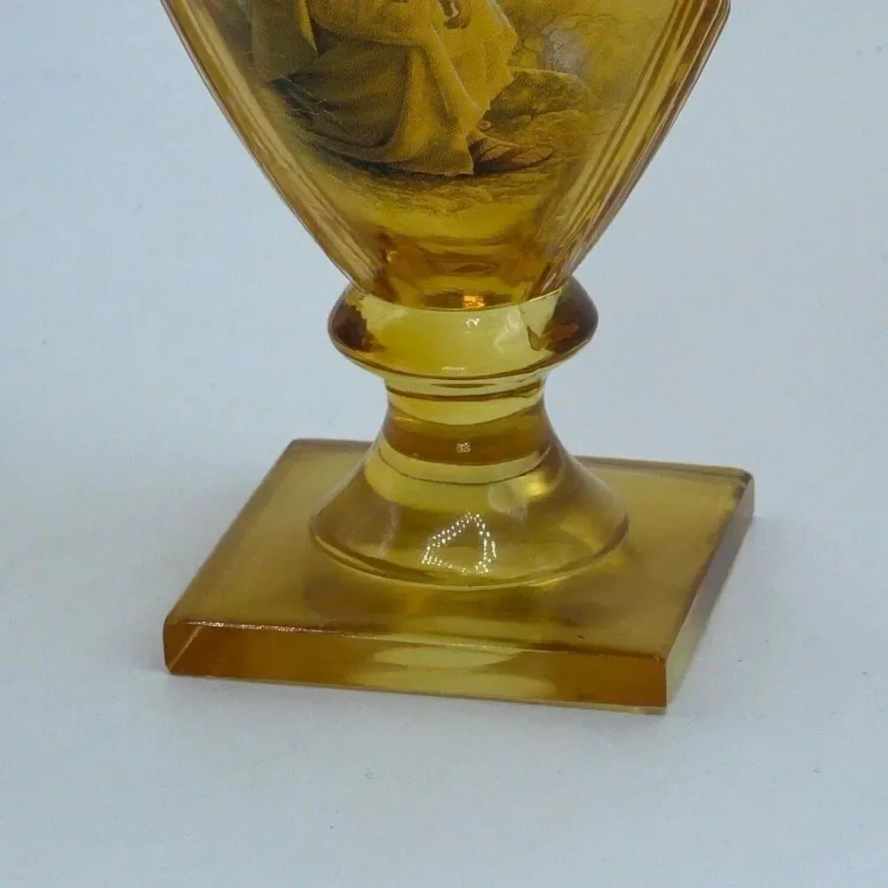 Vintage Amber Glass Religious pedestal goblet with music box lid.